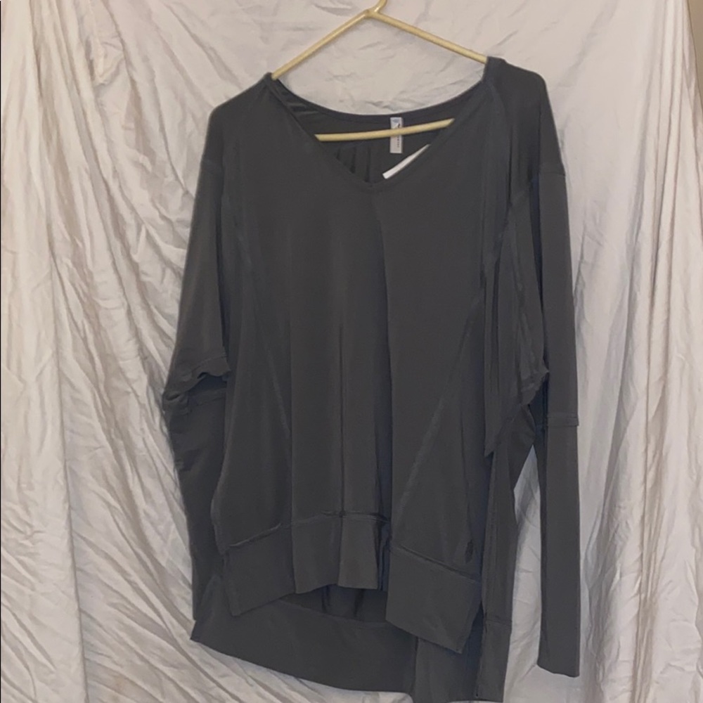 Green colored long sleeve hooded shirt